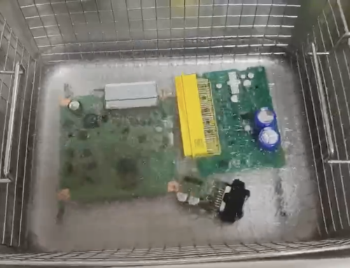 Clean circuit printer board in an ultrasonic cleaner